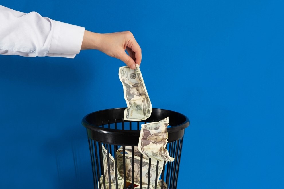 Tossing Money In the Garbage